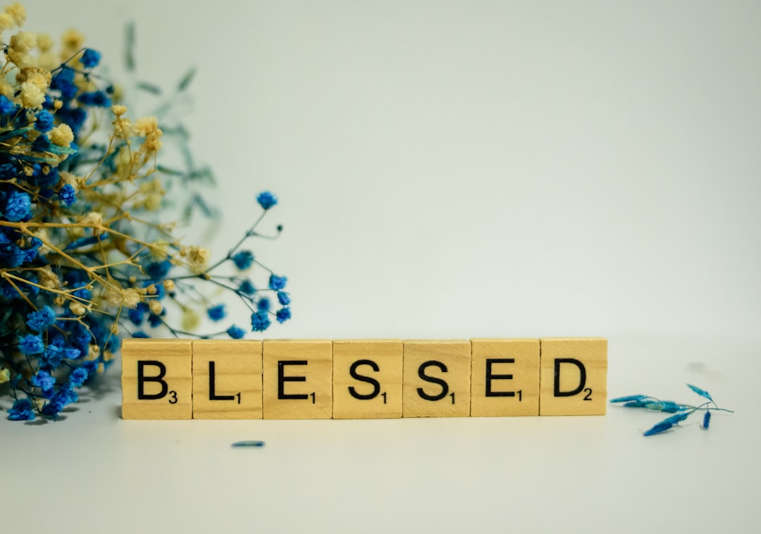 A person offering a blessing or well-wish after someone sneezes, reflecting ancient traditions and modern courtesy.