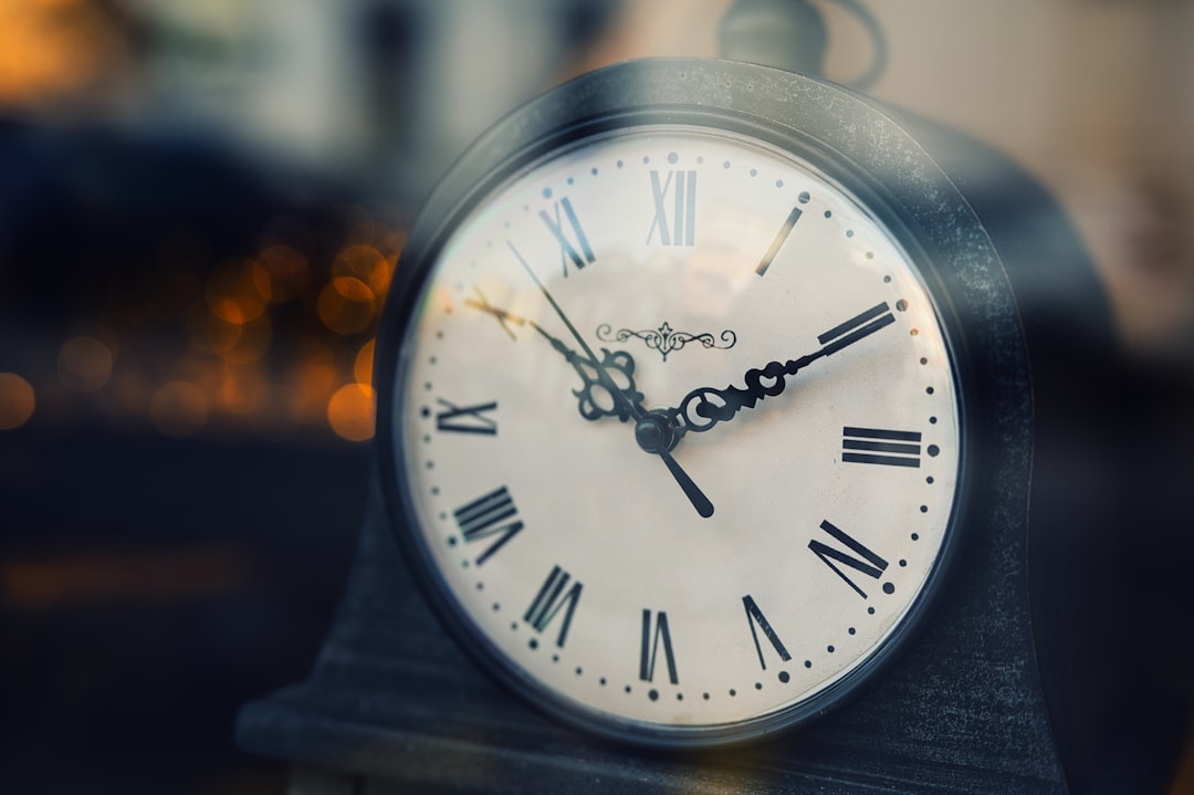 A collection of historical timekeeping devices, from ancient sundials and water clocks to intricate mechanical clocks, symbolizing humanity's evolving relationship with time.