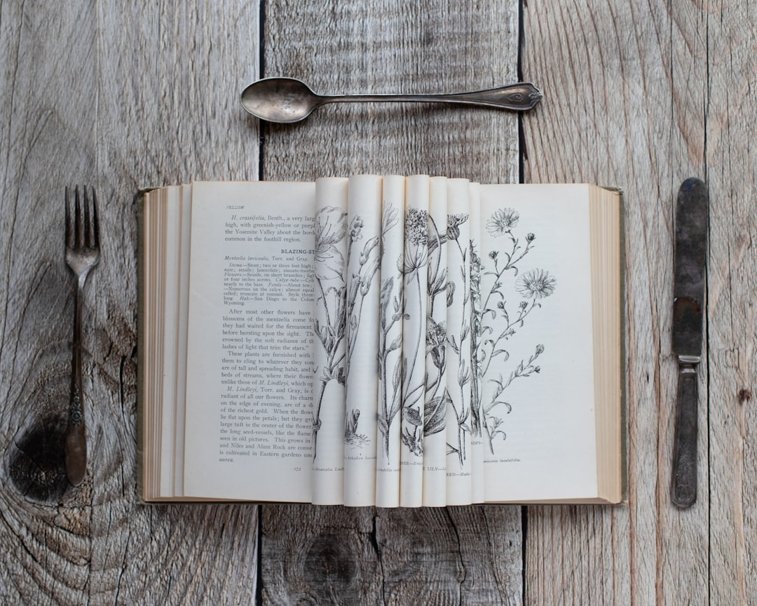 An array of historical forks, showing their evolution from two-pronged tools to modern four-pronged designs, against a backdrop that suggests different eras.