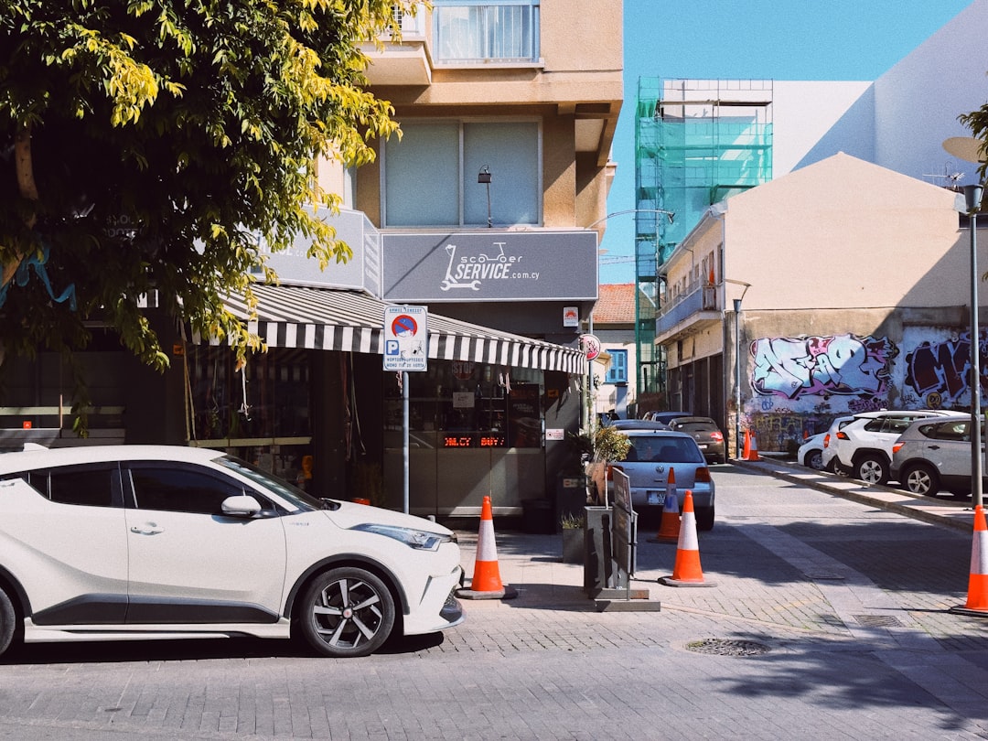 Toyota cars on a road in Cyprus, showcasing right-hand drive vehicles and the island's left-hand traffic flow.