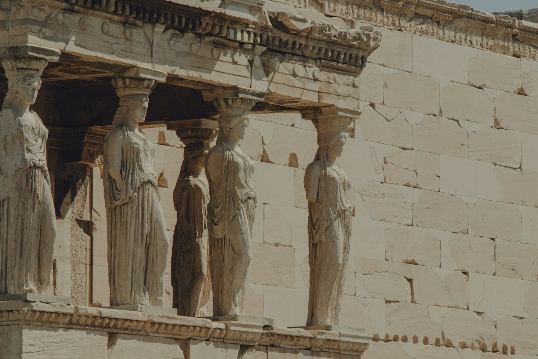 Ancient Roman fullonica workers using urine for washing clothes, illustrating the practice and associated tax.